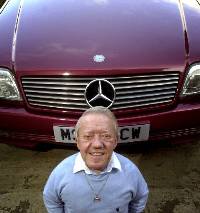 Kenny Baker with one of his Mercedes